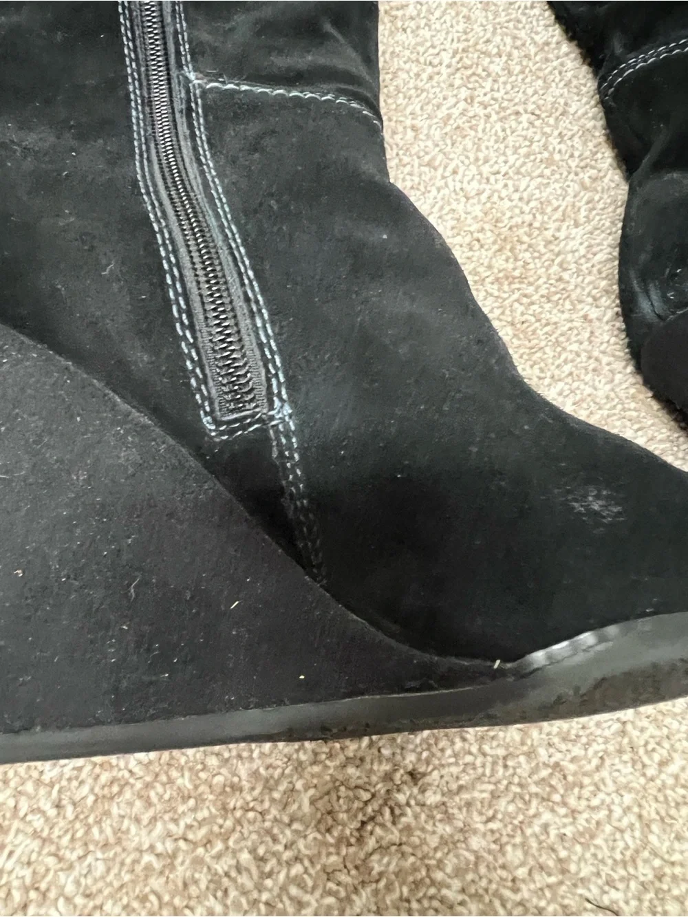 Genuine Stylish black suede knee boots with a comfortable wedge heel.
